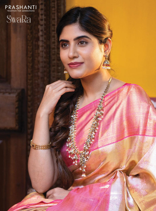 Pure kanjivaram tissue silk saree cream and light pink with allover zari woven brocade weaves and zari woven border