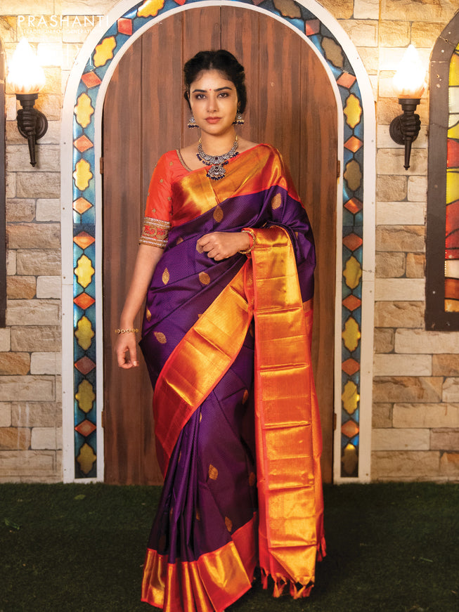 Pure kanjivaram silk saree dark blue and dual shade of pinkish orange with allover self emboss & zari buttas and rich zari woven border