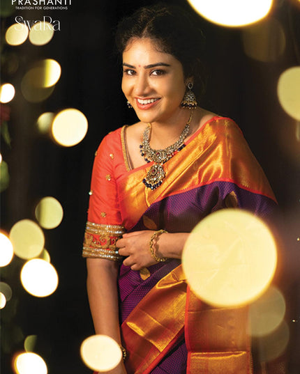 Pure kanjivaram silk saree dark blue and dual shade of pinkish orange with allover self emboss & zari buttas and rich zari woven border