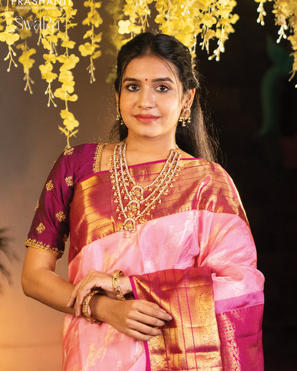 Pure kanjivaram silk saree light pink and pink with allover zari weaves and long zari woven border