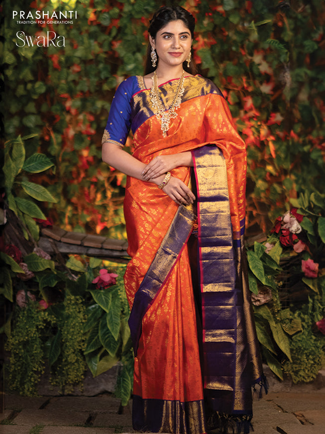 Pure kanjivaram silk saree orange and blue with allover zari weaves and rich annam zari woven border
