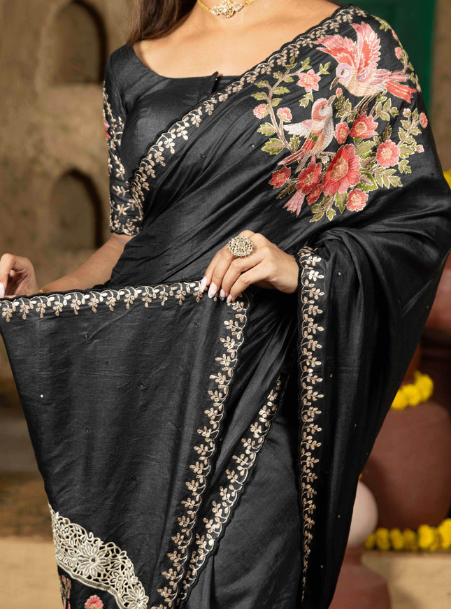 Tussar silk saree black with allover mirror work and placement style embroidery cut work pallu
