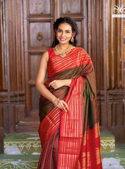 Pure soft silk saree manthulir green and red with allover zari weaves and long zari woven border