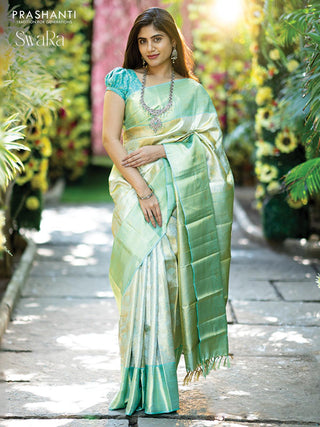 Pure kanjivaram tissue silk saree cream and teal blue with allover zari woven brocade weaves and zari woven border