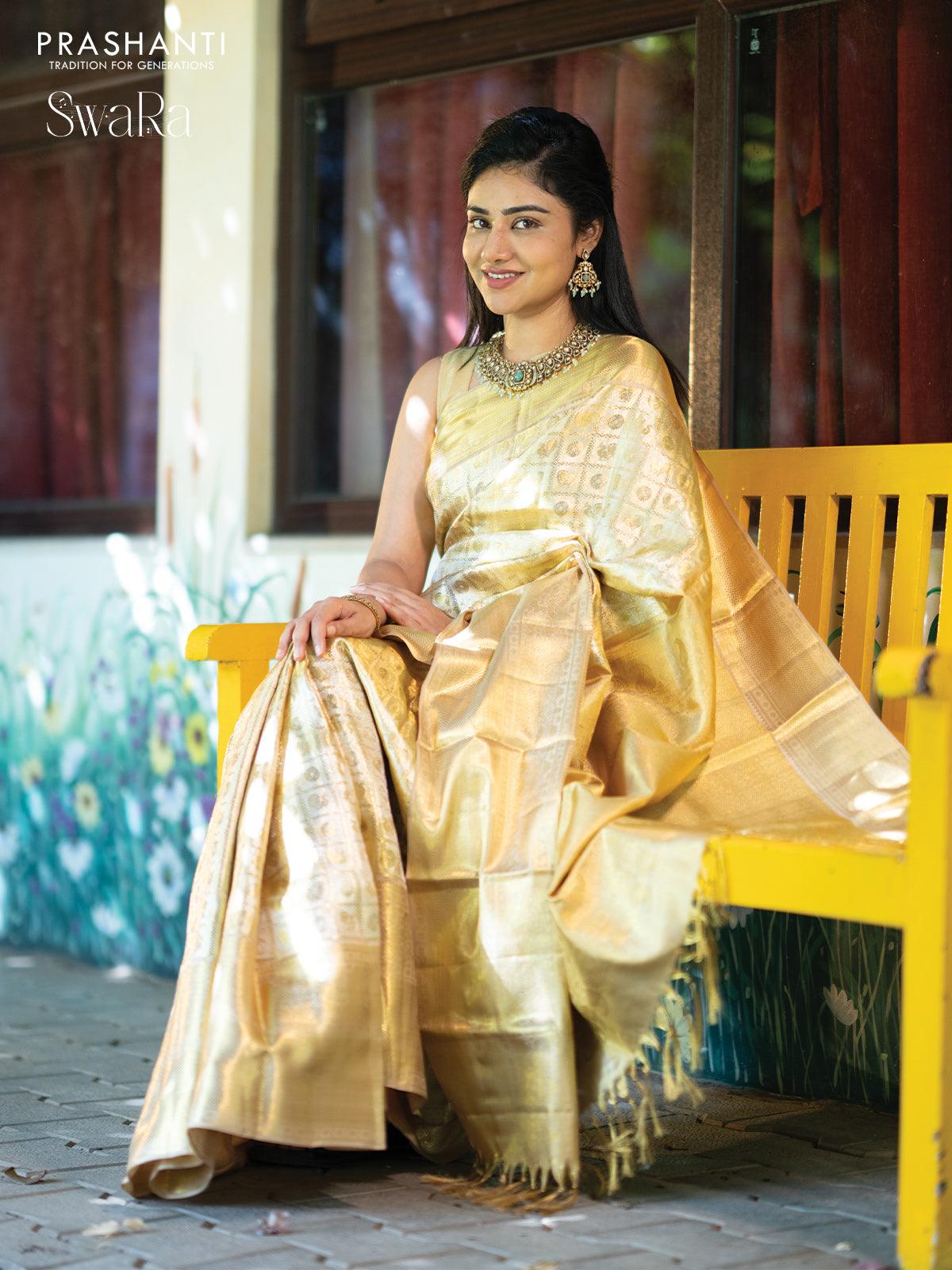 Pure kanjivaram tissue silk saree gold with allover zari woven