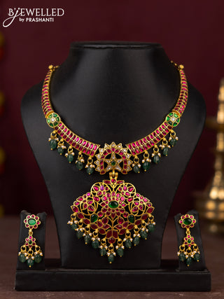 Jadau necklace with jadau kundan stones and pearl & green beads hangings