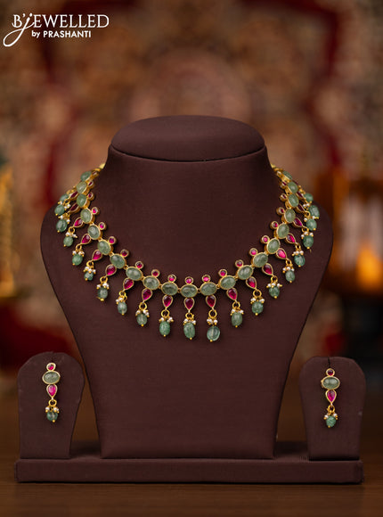 Jadau necklace with pink jadau & mint green stones and beads hangings