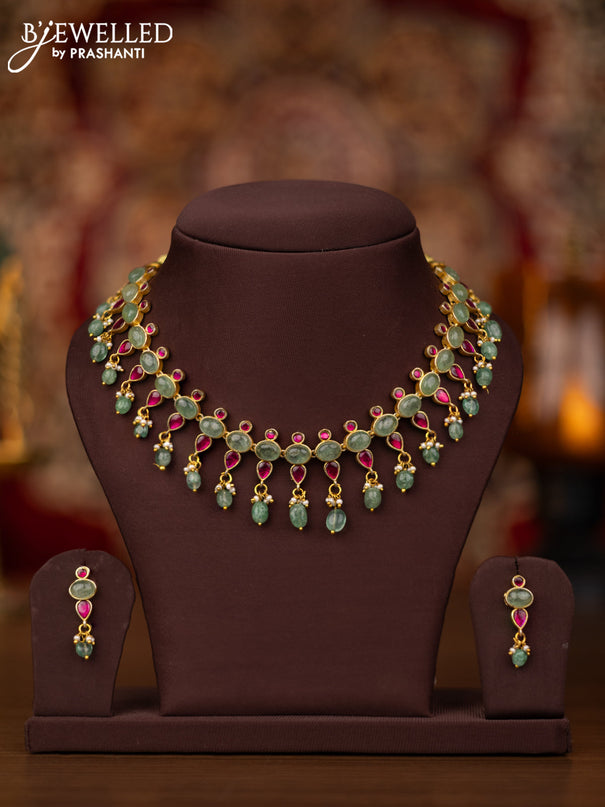 Jadau necklace with pink jadau & mint green stones and beads hangings