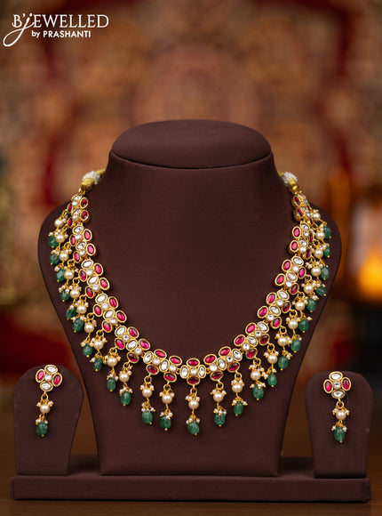 Jadau necklace with pink jadau kundan stones and pearl & beads hangings