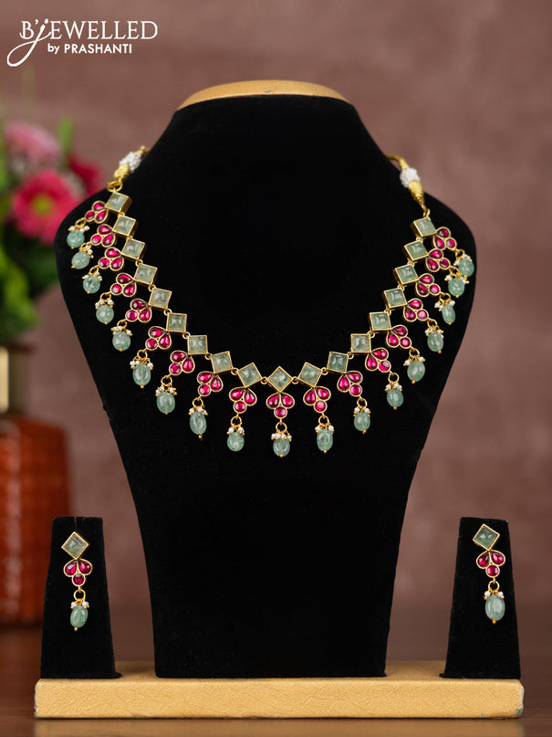Jadau necklace with pink jadau & mint green stones and beads hangings