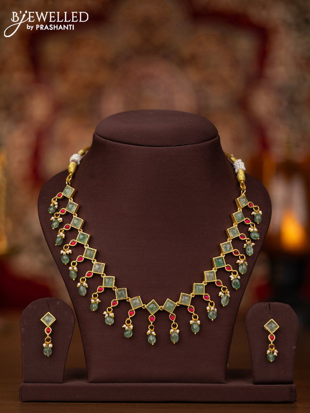 Jadau necklace with pink jadau & mint green stones and beads hangings