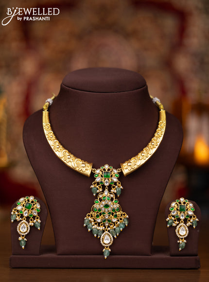 Jadau necklace with green jadau kundan stones and pearl & mint green beads hangings