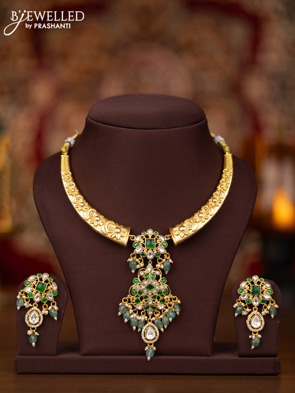 Jadau necklace with green jadau kundan stones and pearl & mint green beads hangings