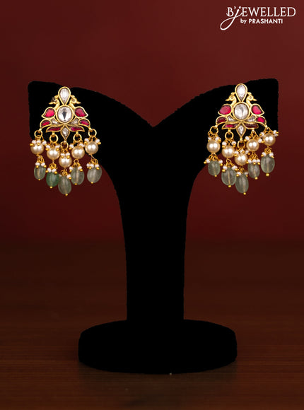 Beaded multilayer green haaram peacock design with pink jadau kundan stones and natural beads & pearl hangings