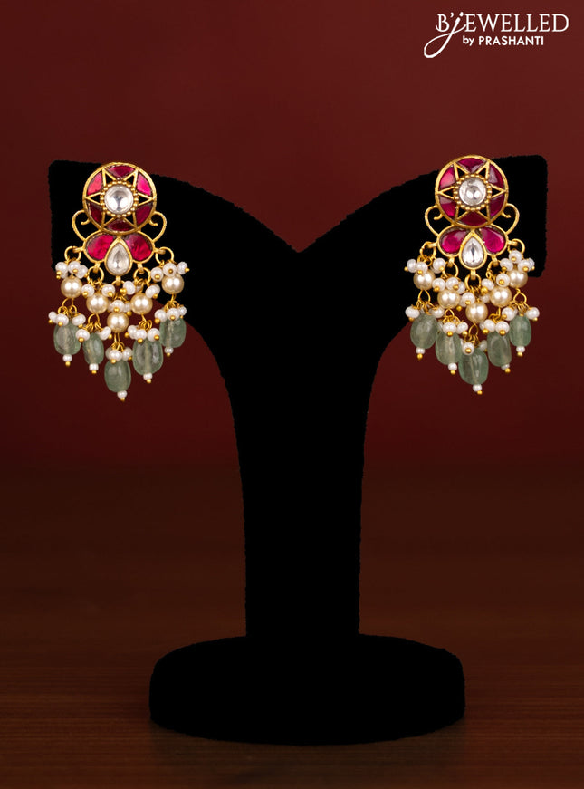 Beaded multilayer maroon haaram with pink jadau kundan stones and natural beads & pearl hangings