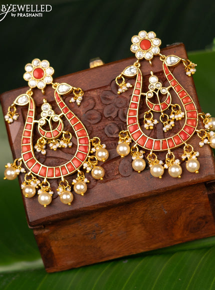 Antique screw type earrings peacock design with pavalam & kundan stones and pearl hangings