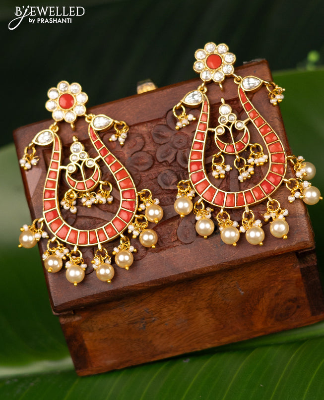 Antique screw type earrings peacock design with pavalam & kundan stones and pearl hangings
