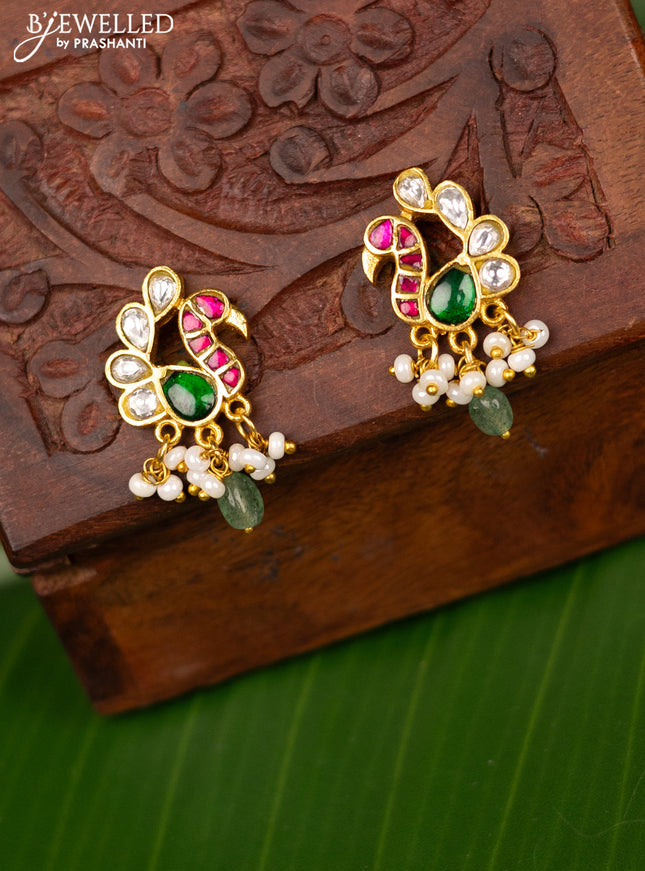 Antique screw type earrings peacock design with jadau kundan stones and pearl & beads hanging