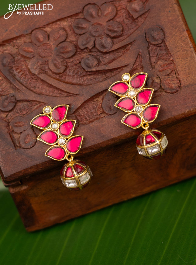 Antique screw type earrings with pink jadau kundan stones