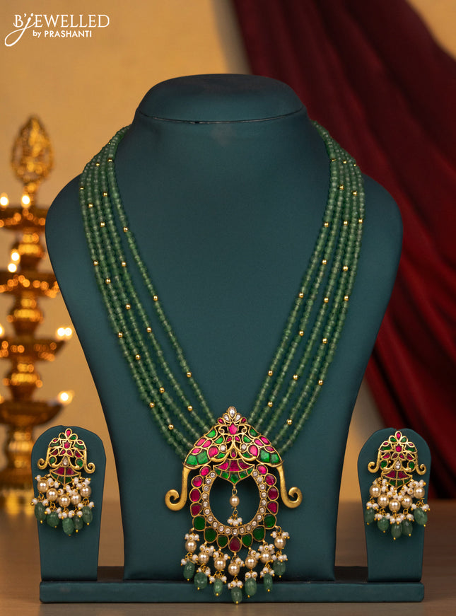 Jadau multilayer mint green beaded necklace with jadau kundan stones green beads and pearl hangings