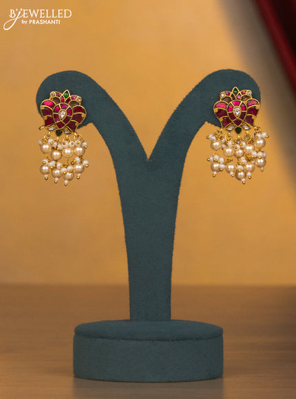 Jadau multilayer pearl necklace with gandaberunda with jadau kundan stones and pearl hangings