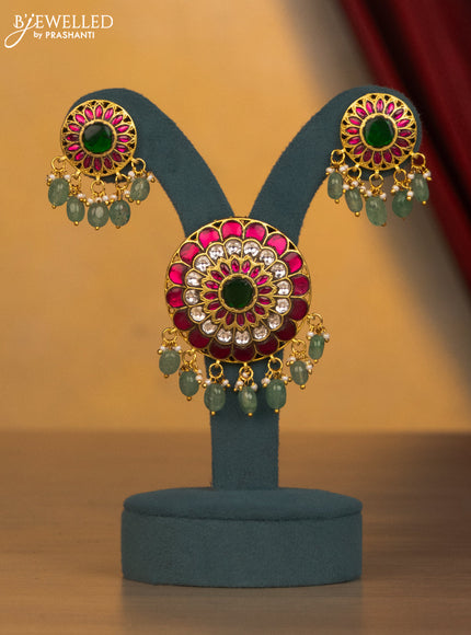 Jadau Pendant floral design with jadau kundan stones and green beads & pearl hangings