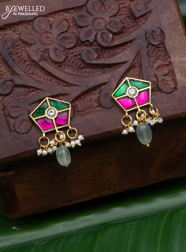 Jadau earrings with jadau kundan stones and pearl & mint green beads hanging
