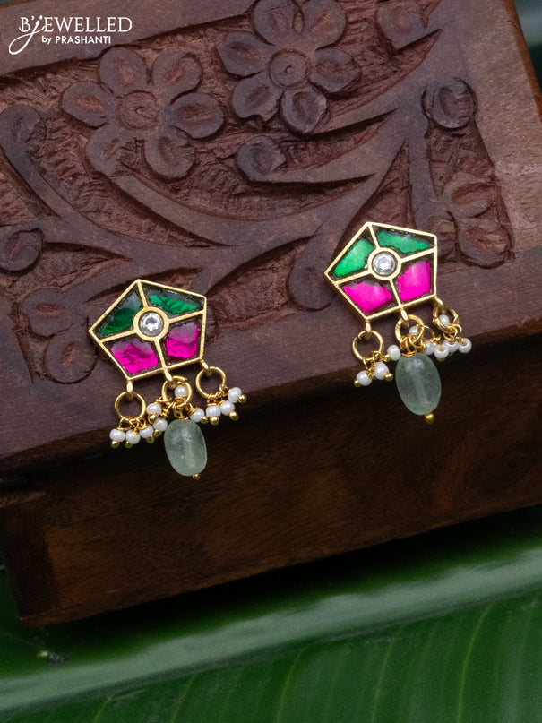 Jadau earrings with jadau kundan stones and pearl & mint green beads hanging