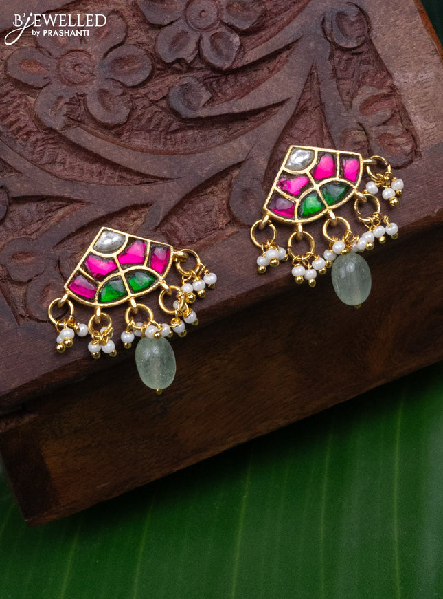 Jadau earrings with jadau kundan stones and pearl & mint green beads hanging