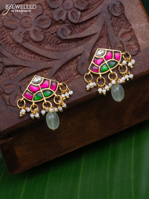 Jadau earrings with jadau kundan stones and pearl & mint green beads hanging