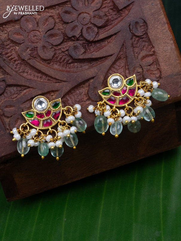 Jadau earrings with jadau kundan stones and pearl & mint green beads hanging