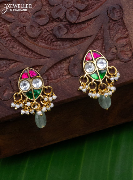 Jadau earrings with jadau kundan stones and pearl & mint green beads hanging