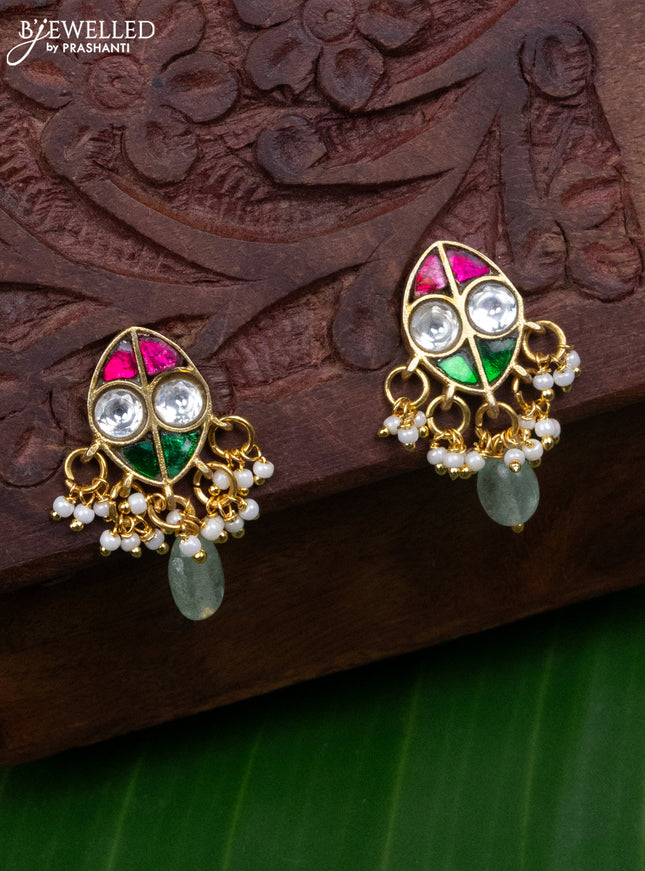 Jadau earrings with jadau kundan stones and pearl & mint green beads hanging