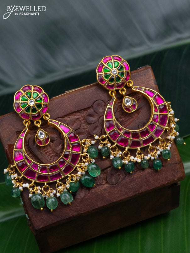 Jadau earrings with jadau kundan stones and pearl & green beads hanging