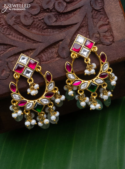 Jadau earrings with jadau kundan stones and pearl & mint green beads hanging