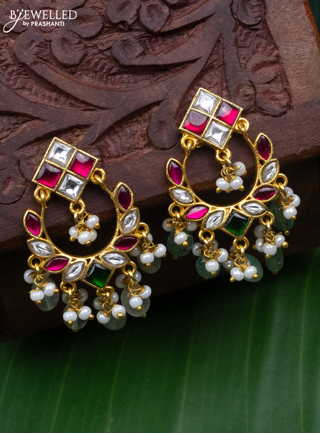 Jadau earrings with jadau kundan stones and pearl & mint green beads hanging