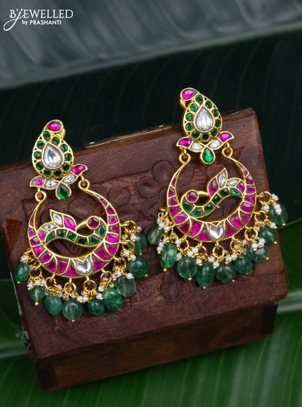 Jadau earrings peacock design with jadau kundan stones and pearl & green beads hanging