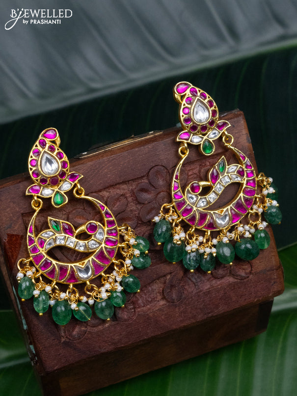 Jadau earrings peacock design with jadau kundan stones and pearl & green beads hanging
