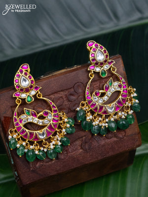 Jadau earrings peacock design with jadau kundan stones and pearl & green beads hanging