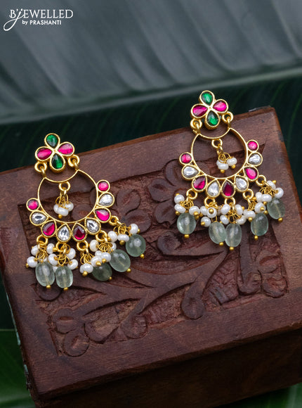 Jadau earrings with jadau kundan stones and pearl & mint green beads hanging
