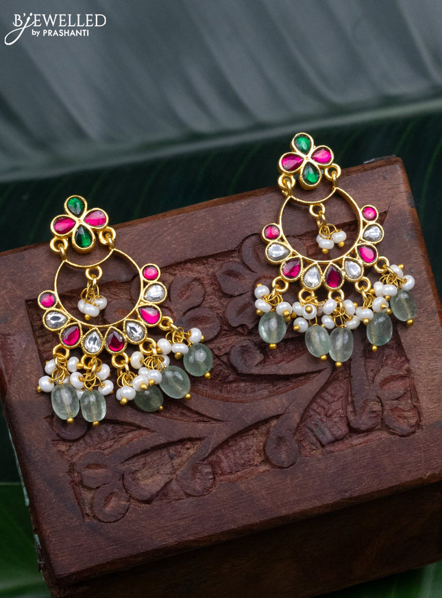 Jadau earrings with jadau kundan stones and pearl & mint green beads hanging
