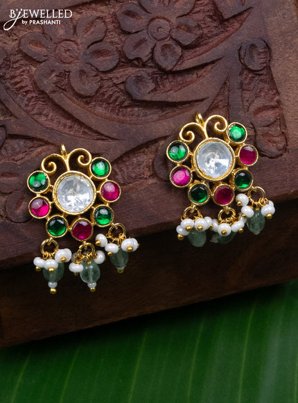 Jadau screw type earrings with jadau kundan stones and pearl & mint green beads hanging