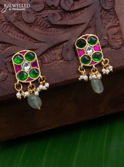 Jadau earrings with jadau kundan stones and pearl & mint green beads hanging