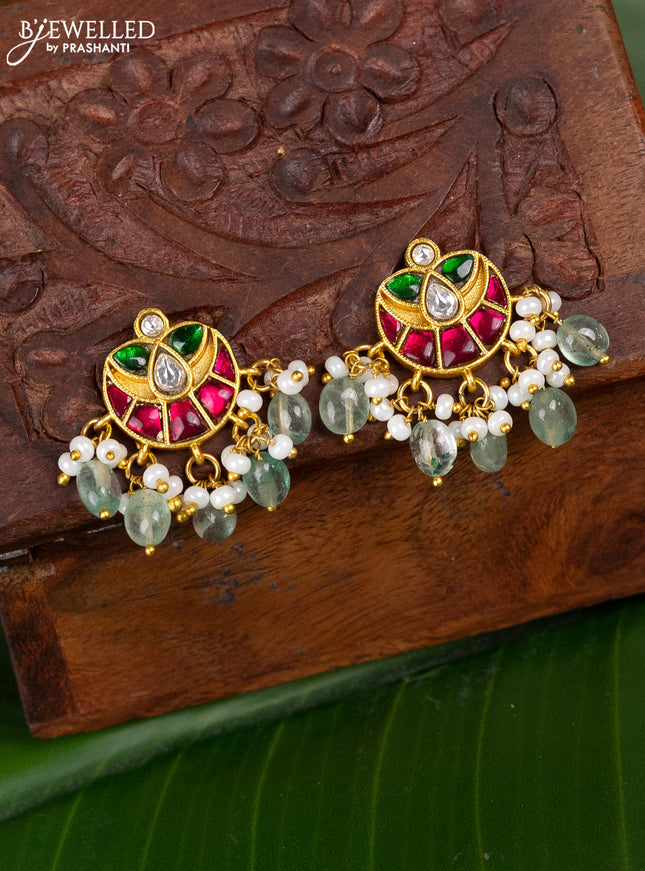 Jadau earrings with jadau kundan stones and pearl & mint green beads hanging