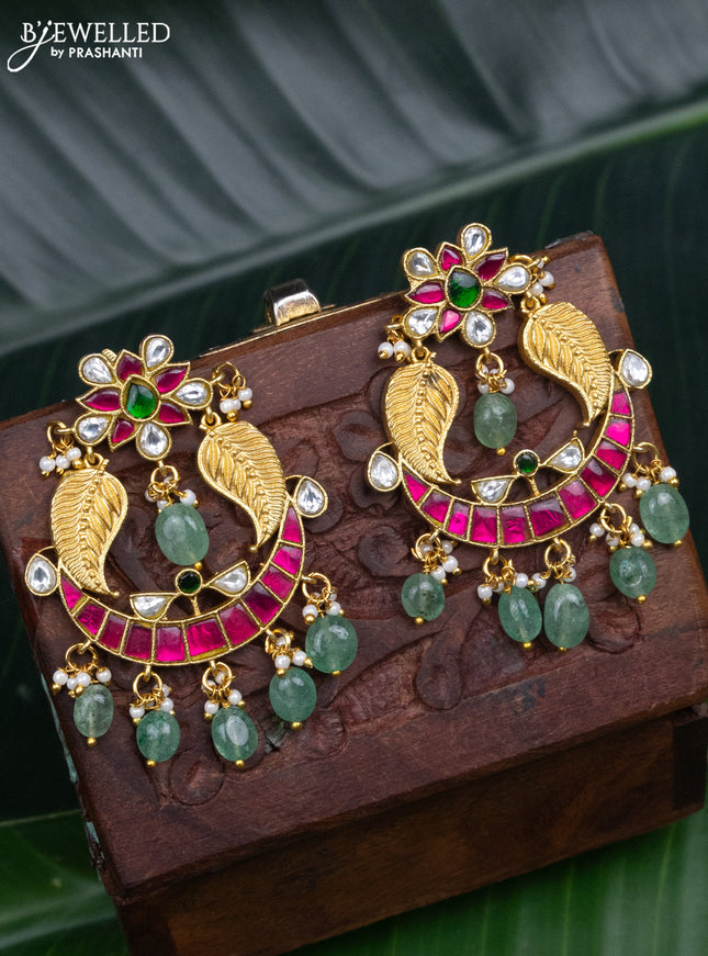 Jadau screw type earrings leaf & chandbali design with jadau kundan stones and pearl & mint green beads hanging