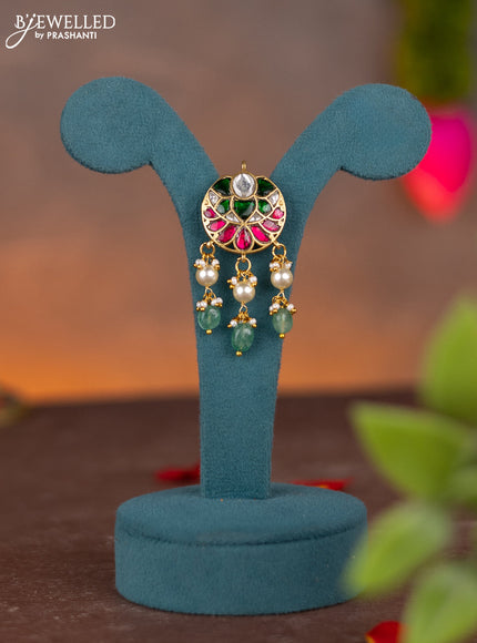 Jadau pendant with jadau kundan stones and pearl & green beads hanging