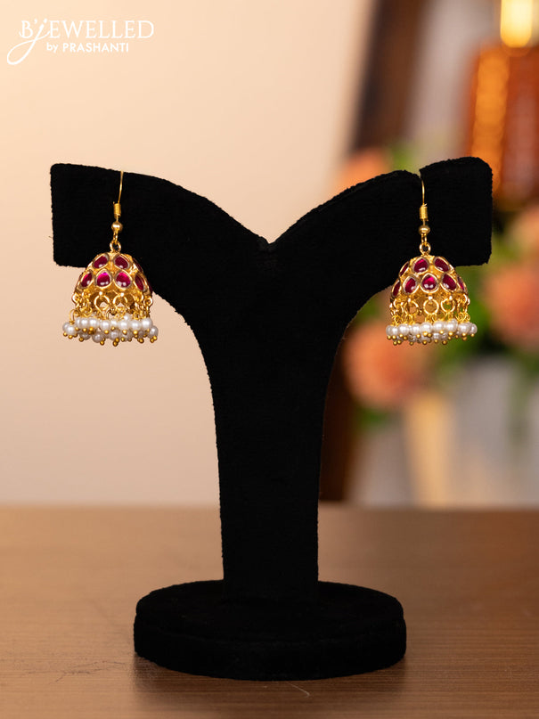 Jadau hanging type jhumkas with pink jadau stones and pearl hangings