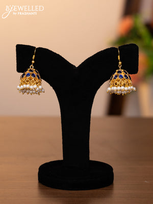 Jadau hanging type jhumkas with sapphire jadau stones and pearl hangings