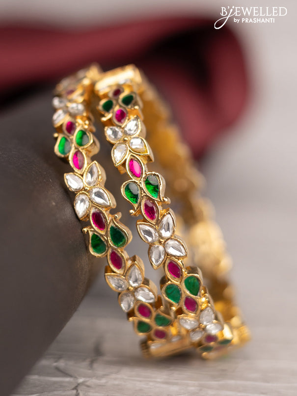 Antique screw type bangle with floral design and jadau & kundan stones