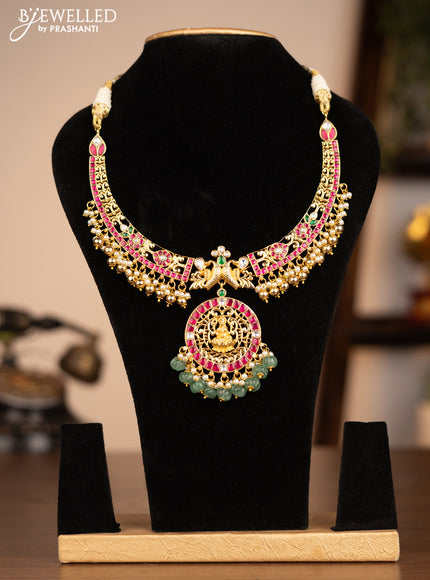 Antique necklace lakshmi pendant with jadau kundan stones and pearl & pumpkin beads hanging without earrings